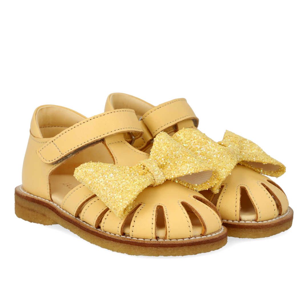 Toddler sandal with glitter bow and Velcro closure