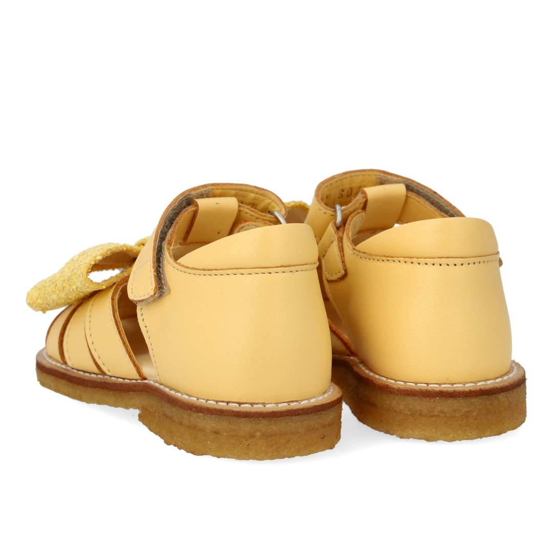 Toddler sandal with glitter bow and Velcro closure