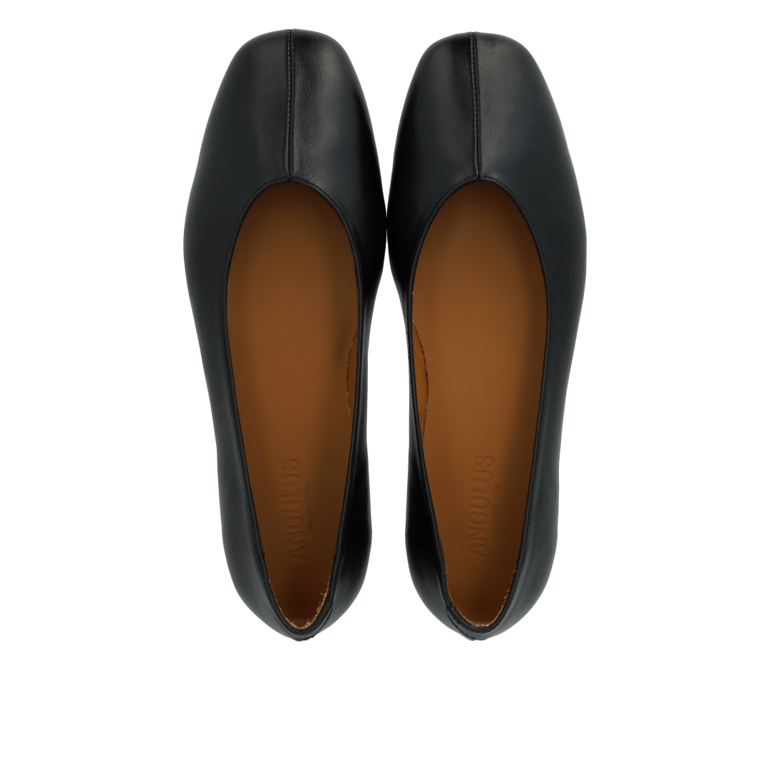 Ballerina with centered decorative stitching detail