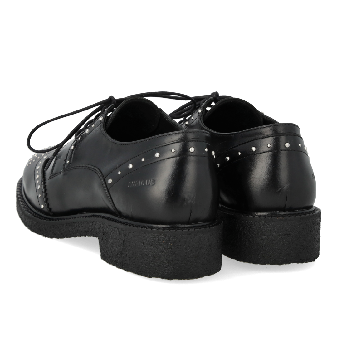 Chunky lace-up leather shoes with decorative studs