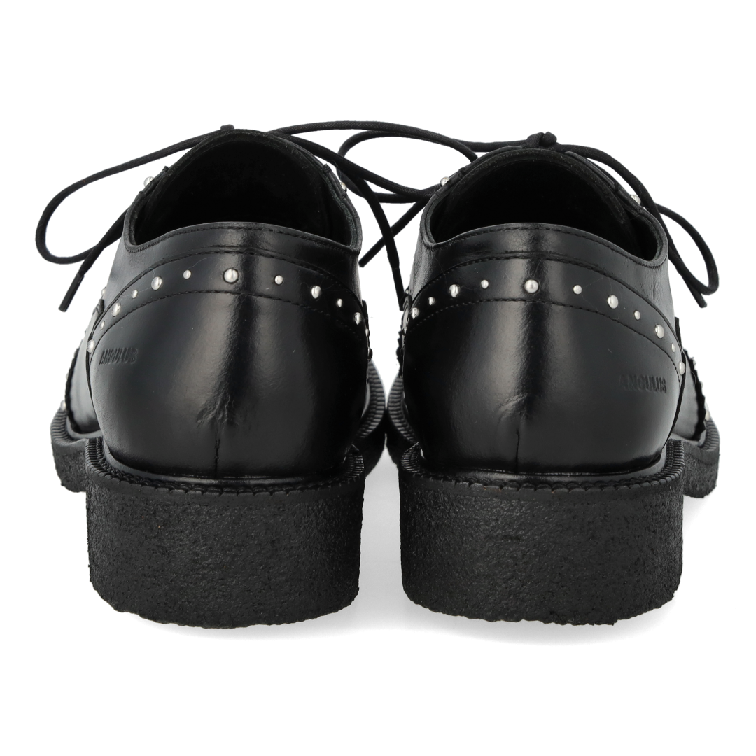 Chunky lace-up leather shoes with decorative studs