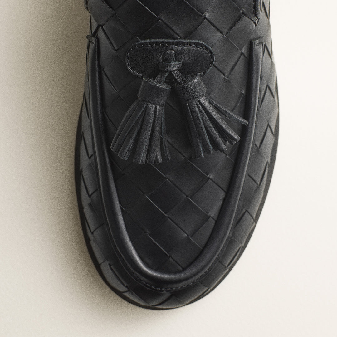 Braided loafer with tassel details