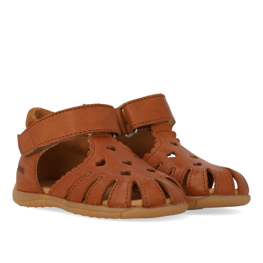 first steps sandal with cut-out heart pattern