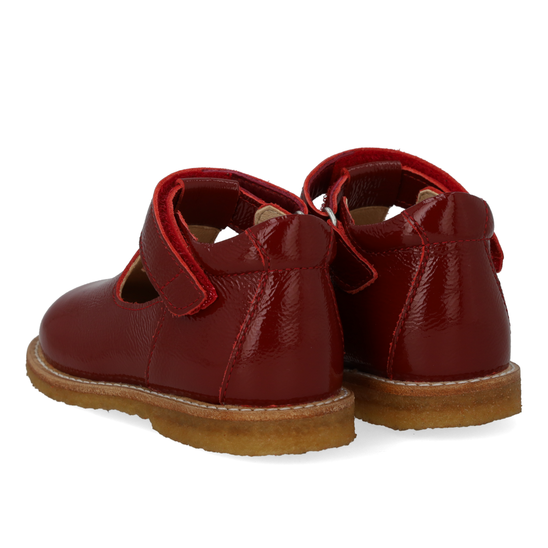 Classic Mary Janes with Cut-Out Heart Motif