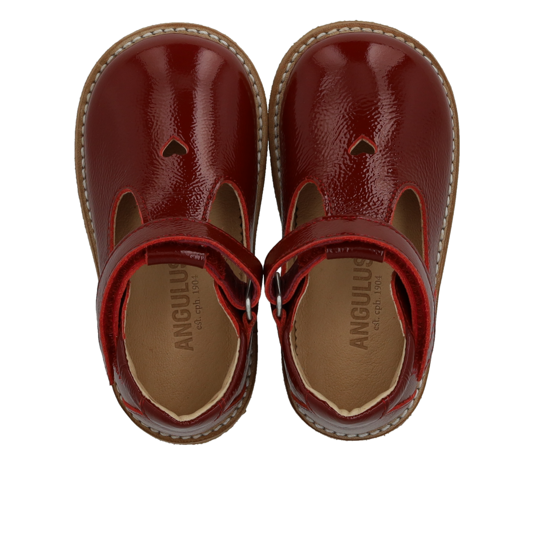 Classic Mary Janes with Cut-Out Heart Motif