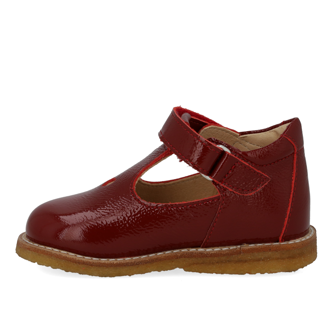 Classic Mary Janes with Cut-Out Heart Motif