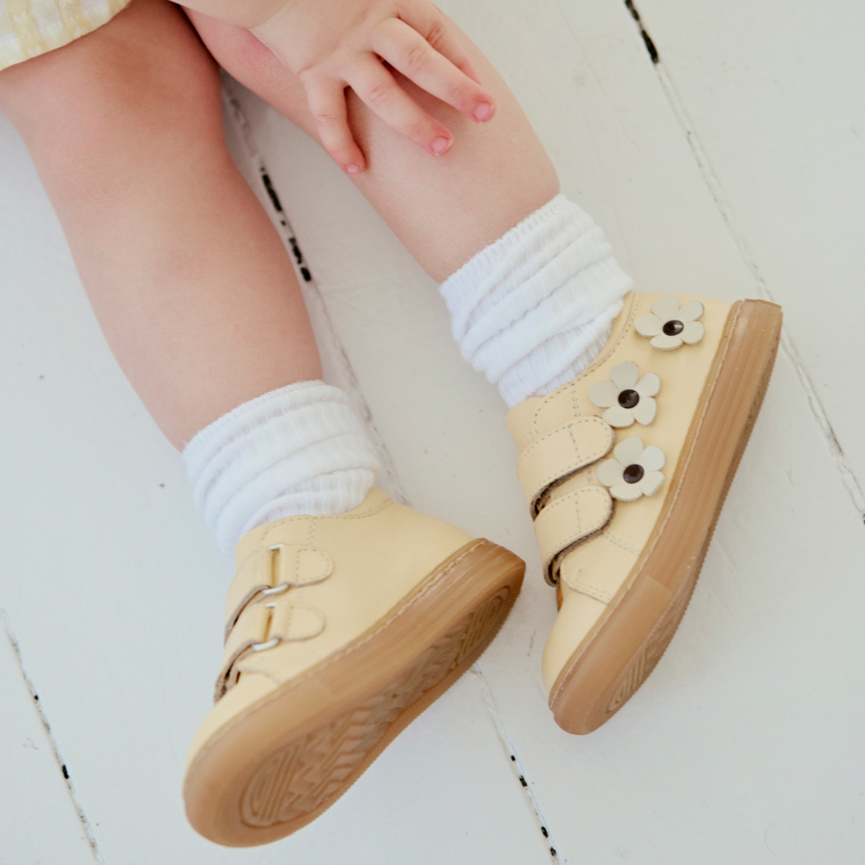 Toddler sneaker with floral appliqués