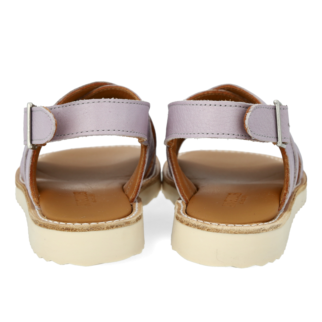 Padded cross sandal with buckle closure