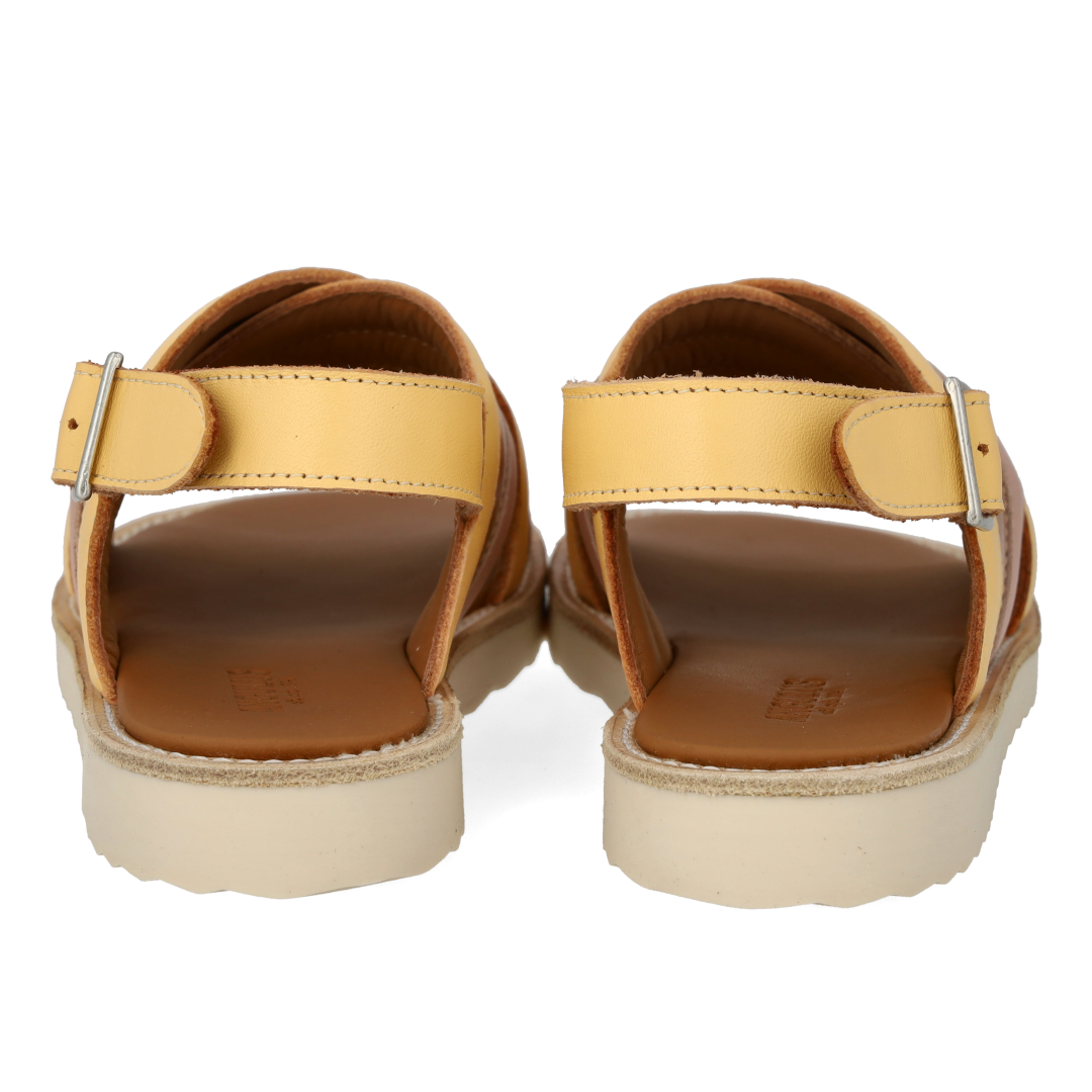 Padded cross-strap sandal with buckle closure