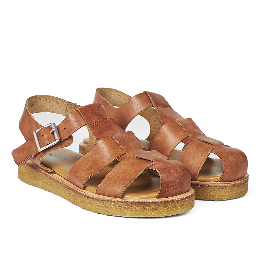 Sandal with buckle and closed toe