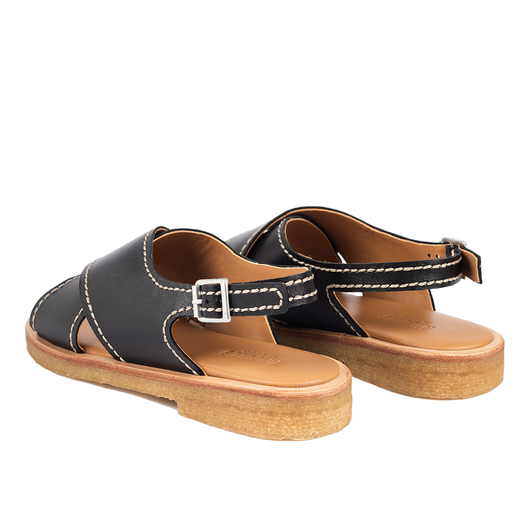Cross-strap sandal with detailed stitching and buckle