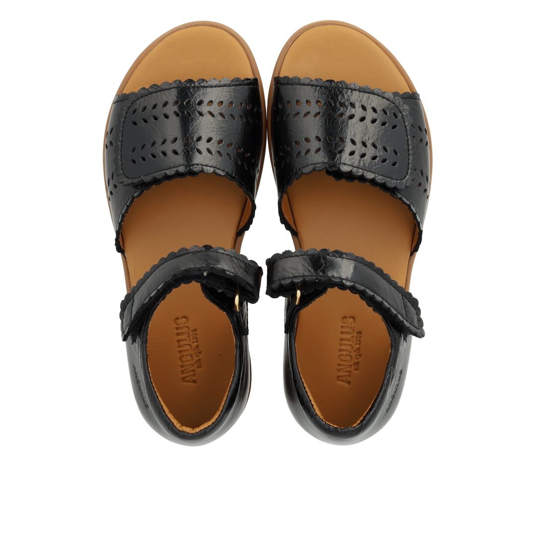 Perforated sandal with double velcro