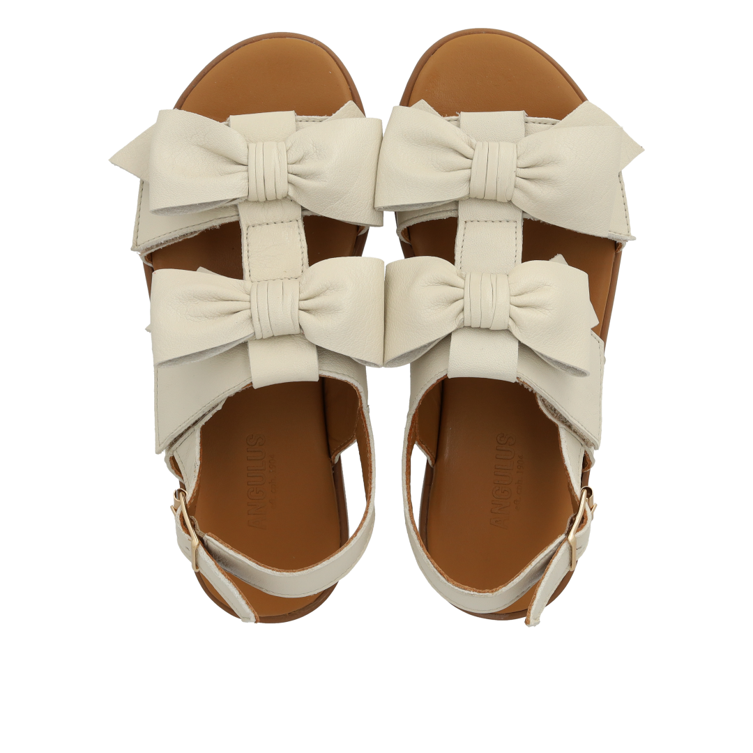 Sandal with bow, velcro and buckle
