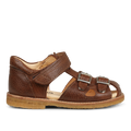 Sandal with adjustable velcro and buckles