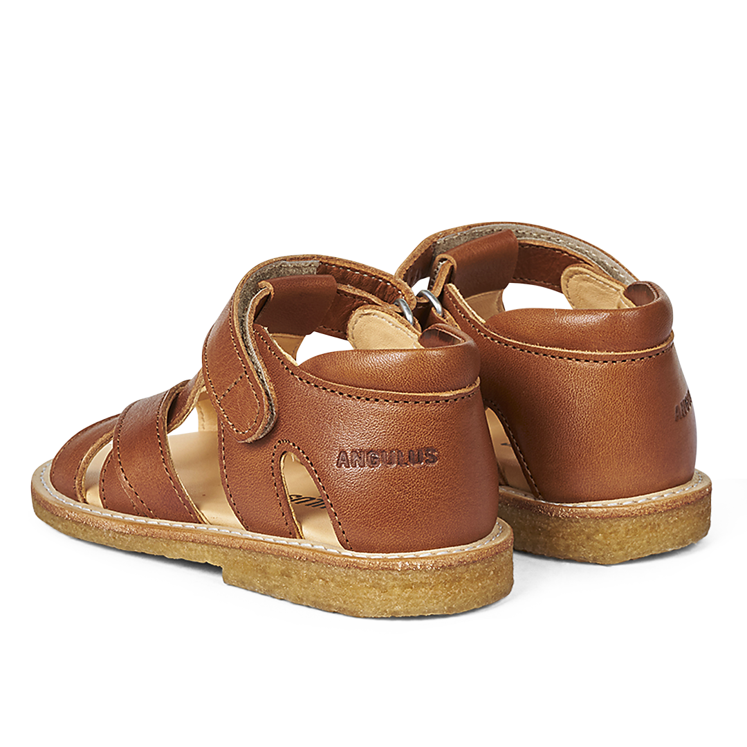 Criss-cross sandal with open toe and Velcro closure
