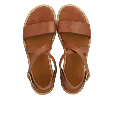 Sandal w. adjustable cross over buckle strap.