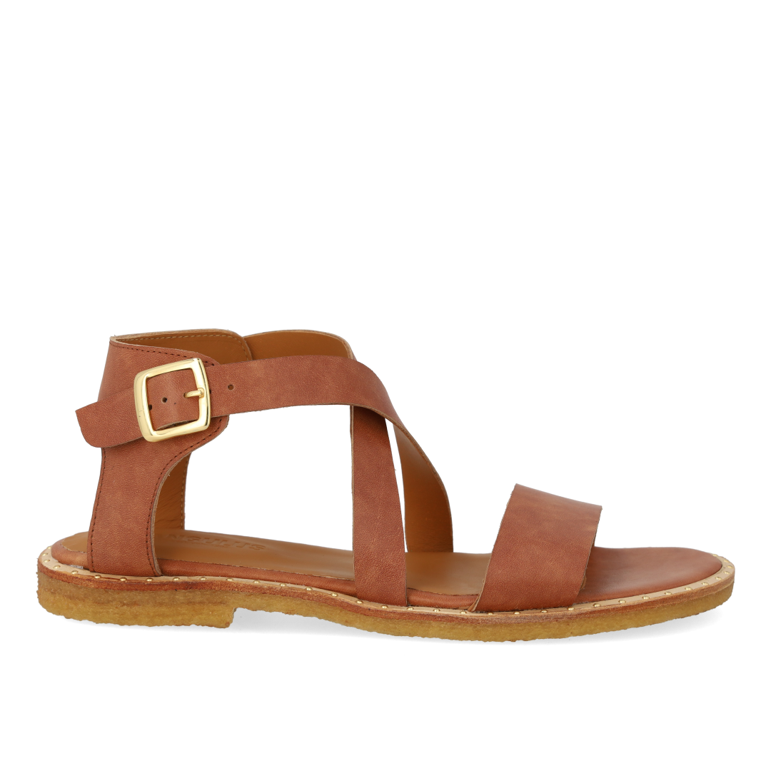 Sandal with crisscross straps and ankle buckle