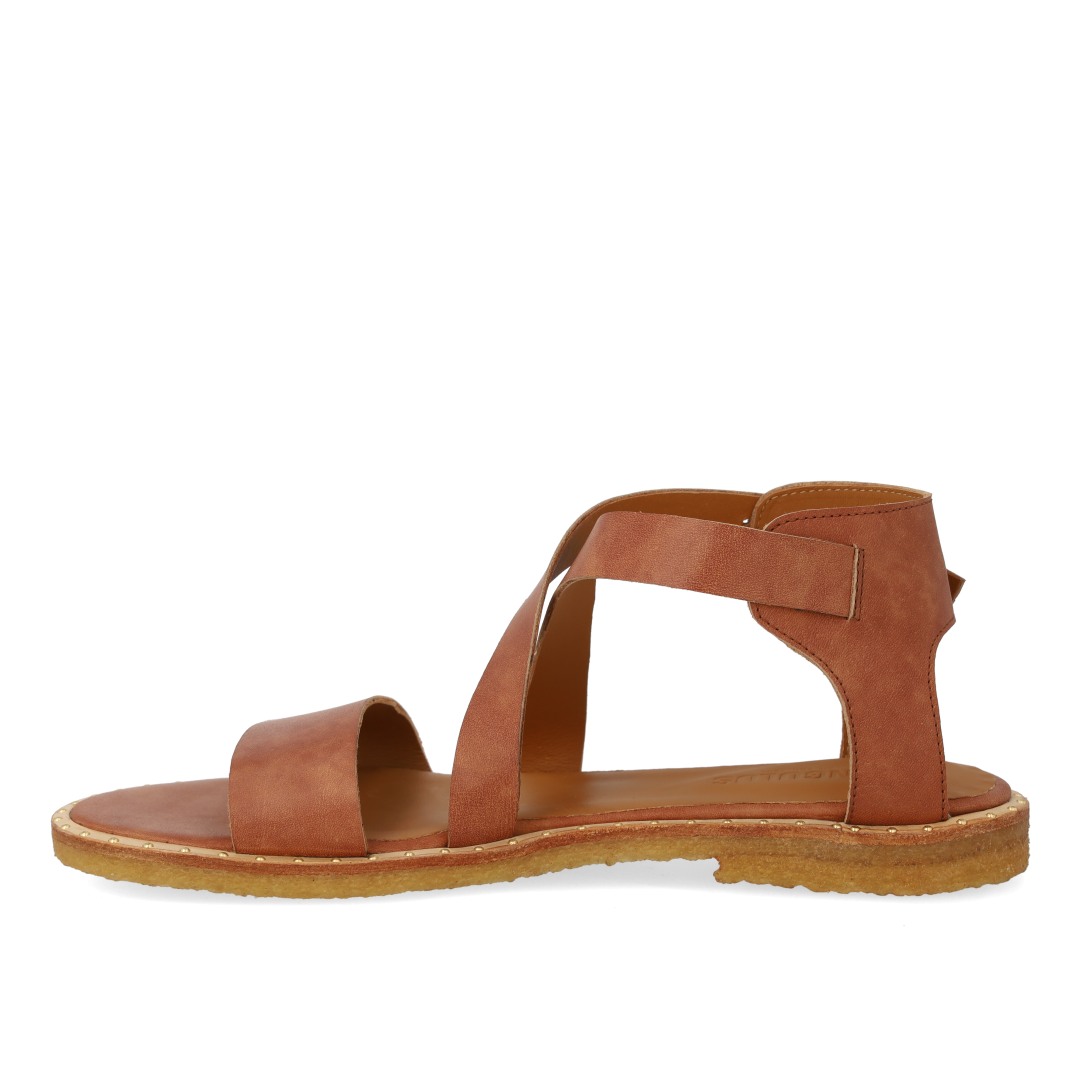 Sandal with crisscross straps and ankle buckle