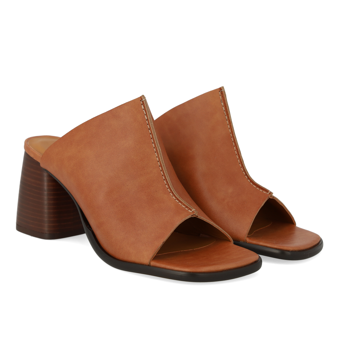 Mule with sculptural heel