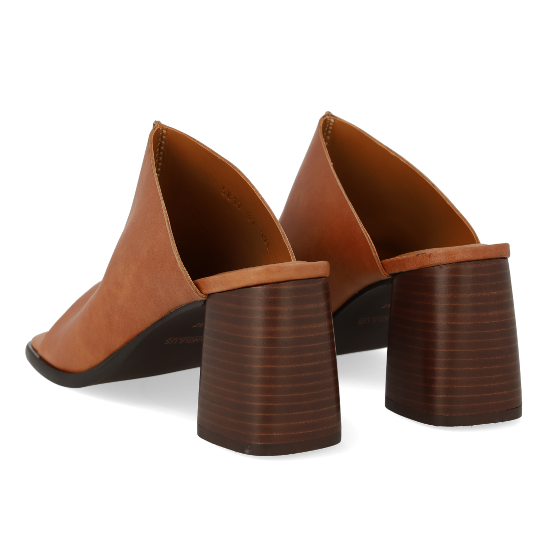 Mule with sculptural heel