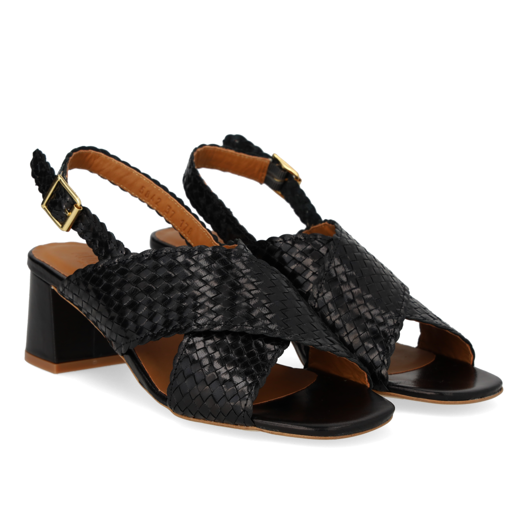 High cross-strap sandal in hand-braided leather