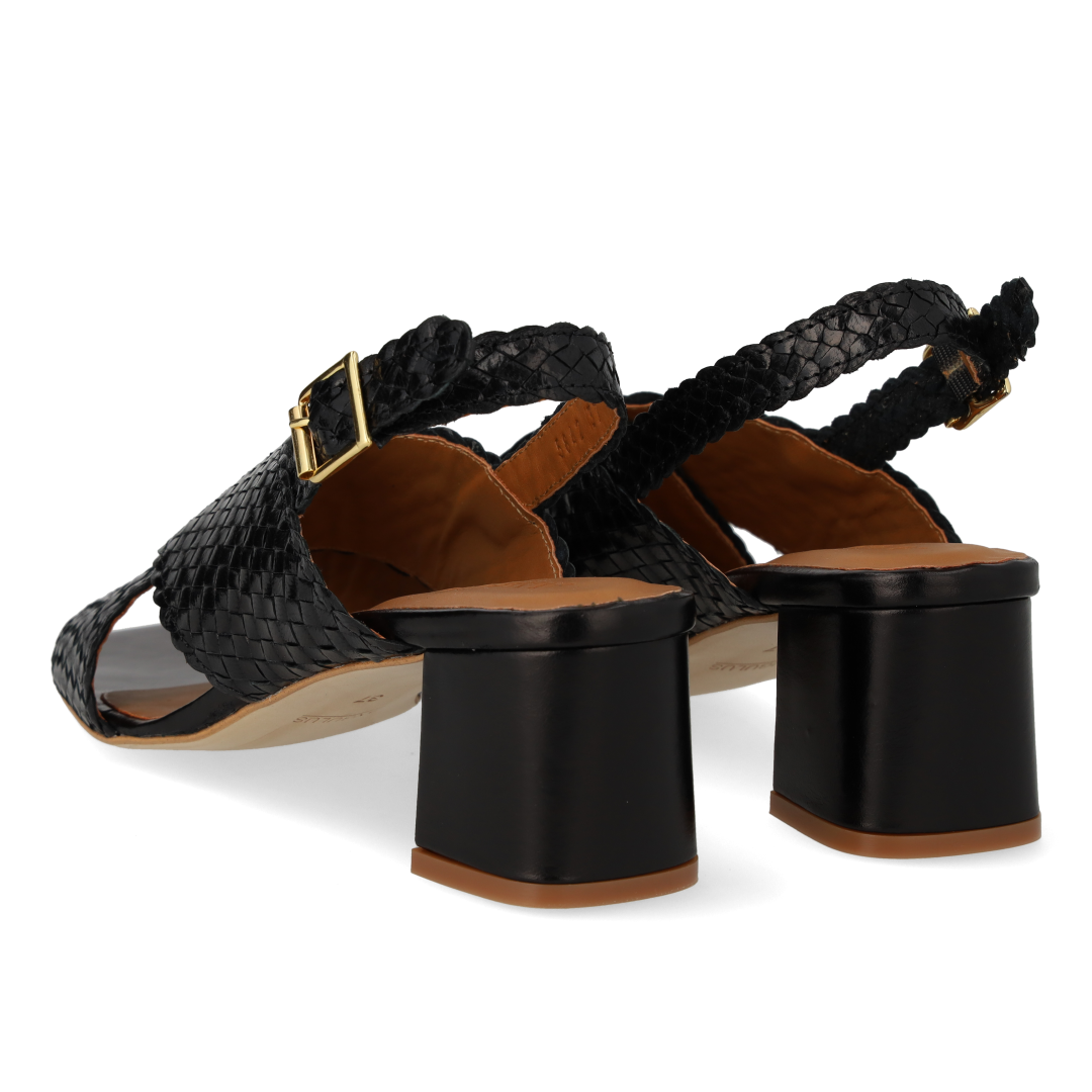 High cross-strap sandal in hand-braided leather