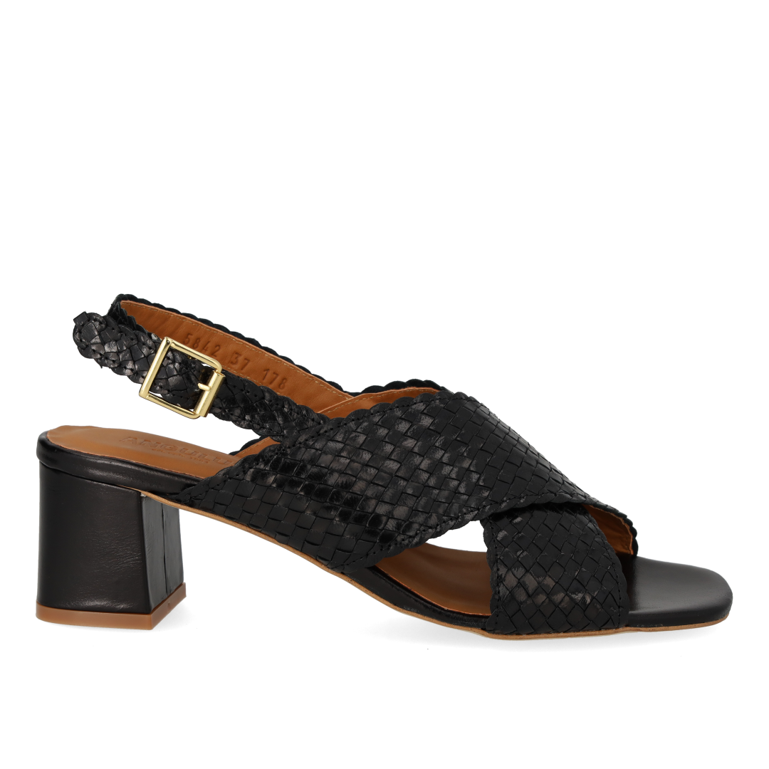 High cross-strap sandal in hand-braided leather