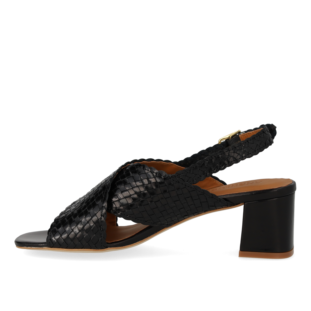 High cross-strap sandal in hand-braided leather