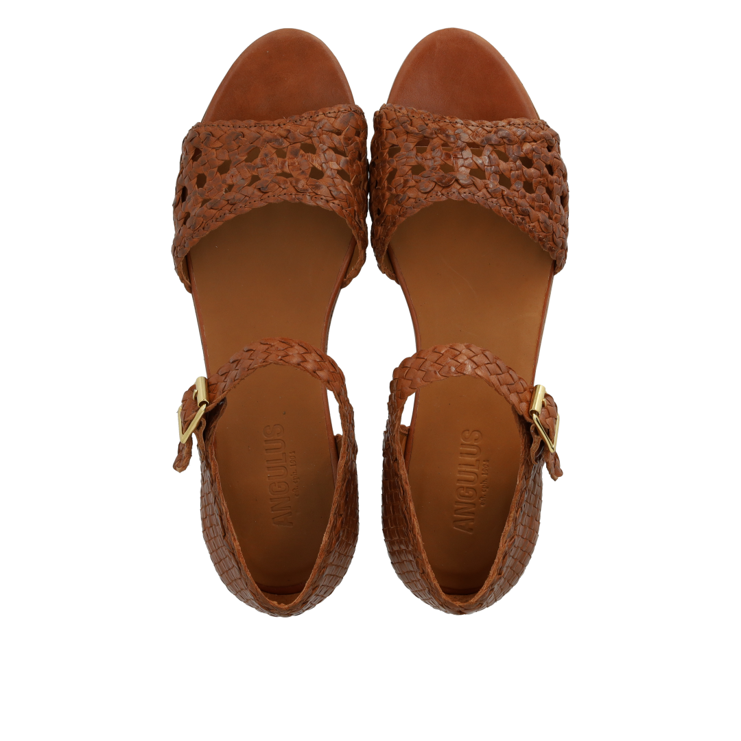 hand-braided sandal with cut-out pattern detail