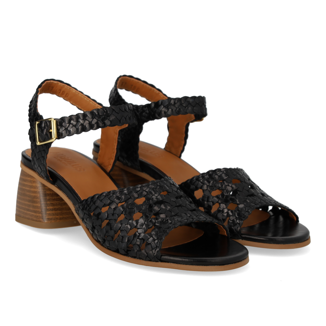 Hand-braided sandal with sculptural heel