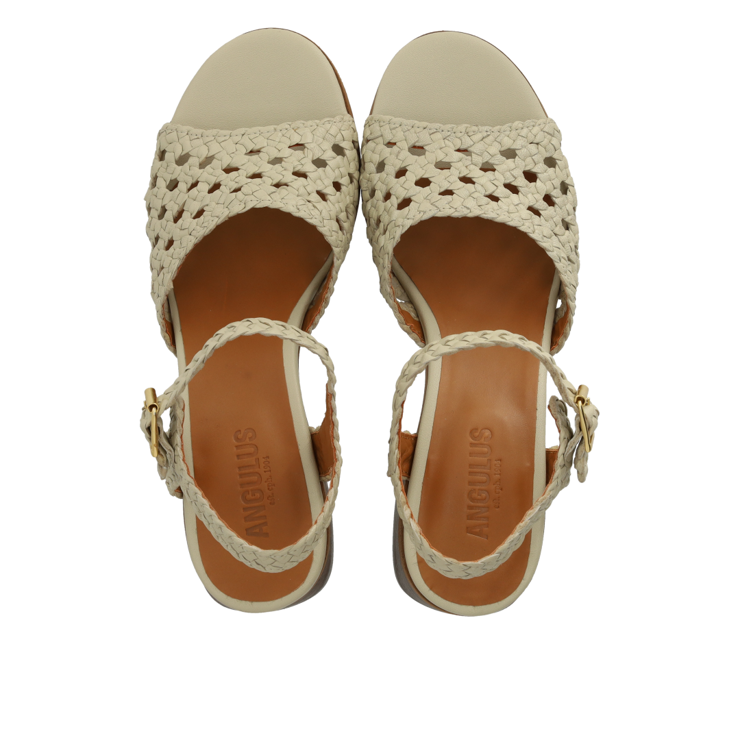 Hand-braided sandal with sculptural heel