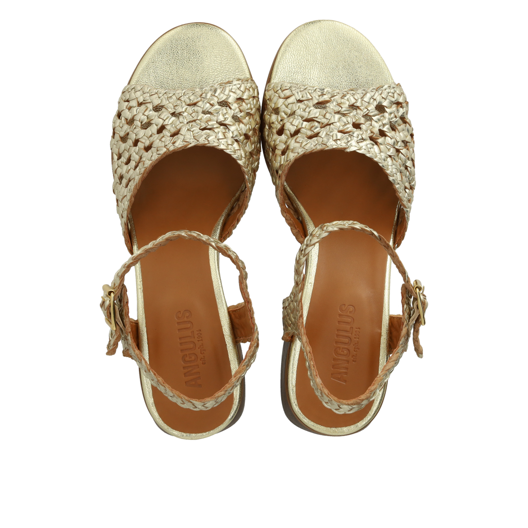 Hand-braided sandal with sculptural heel