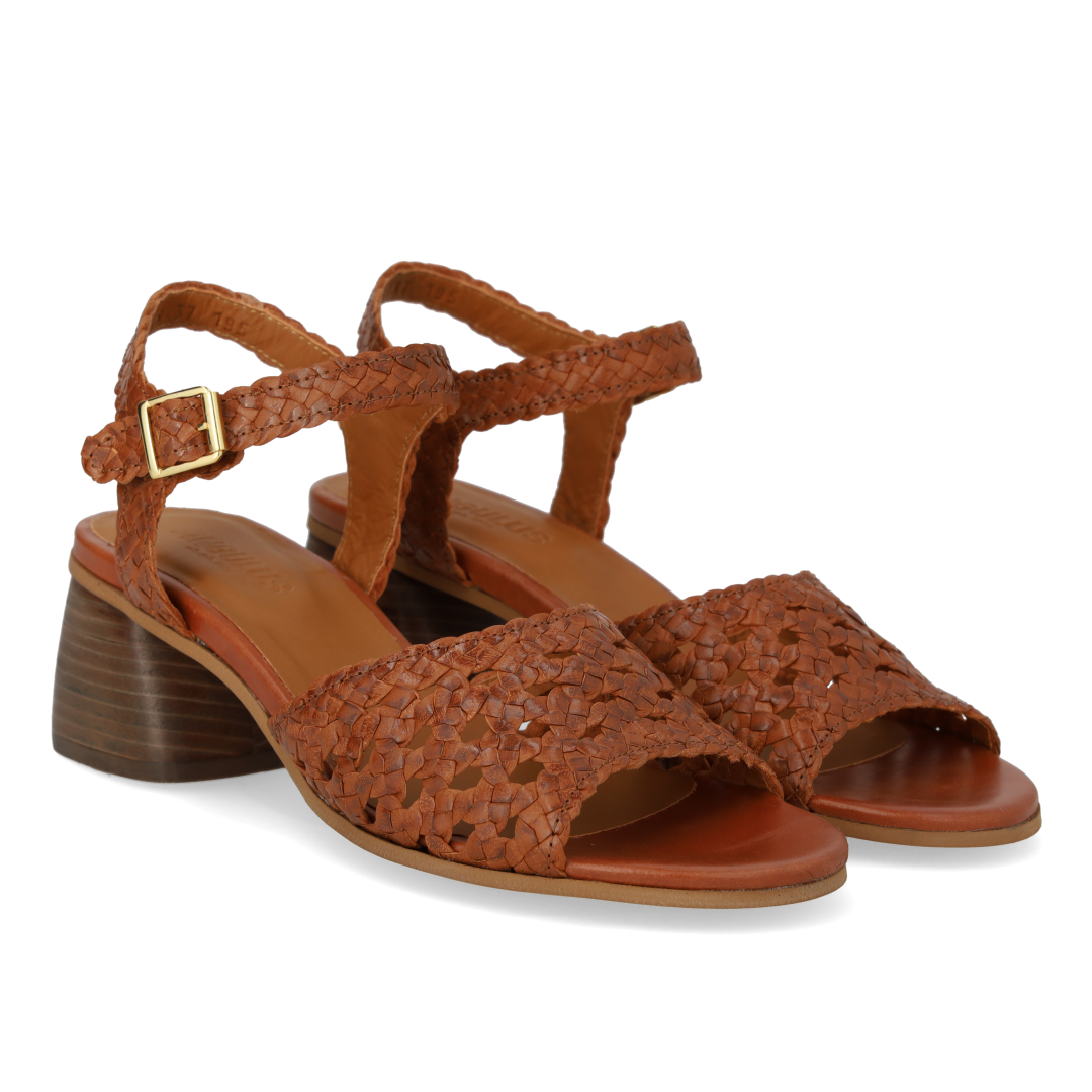 Hand-braided sandal with sculptural heel