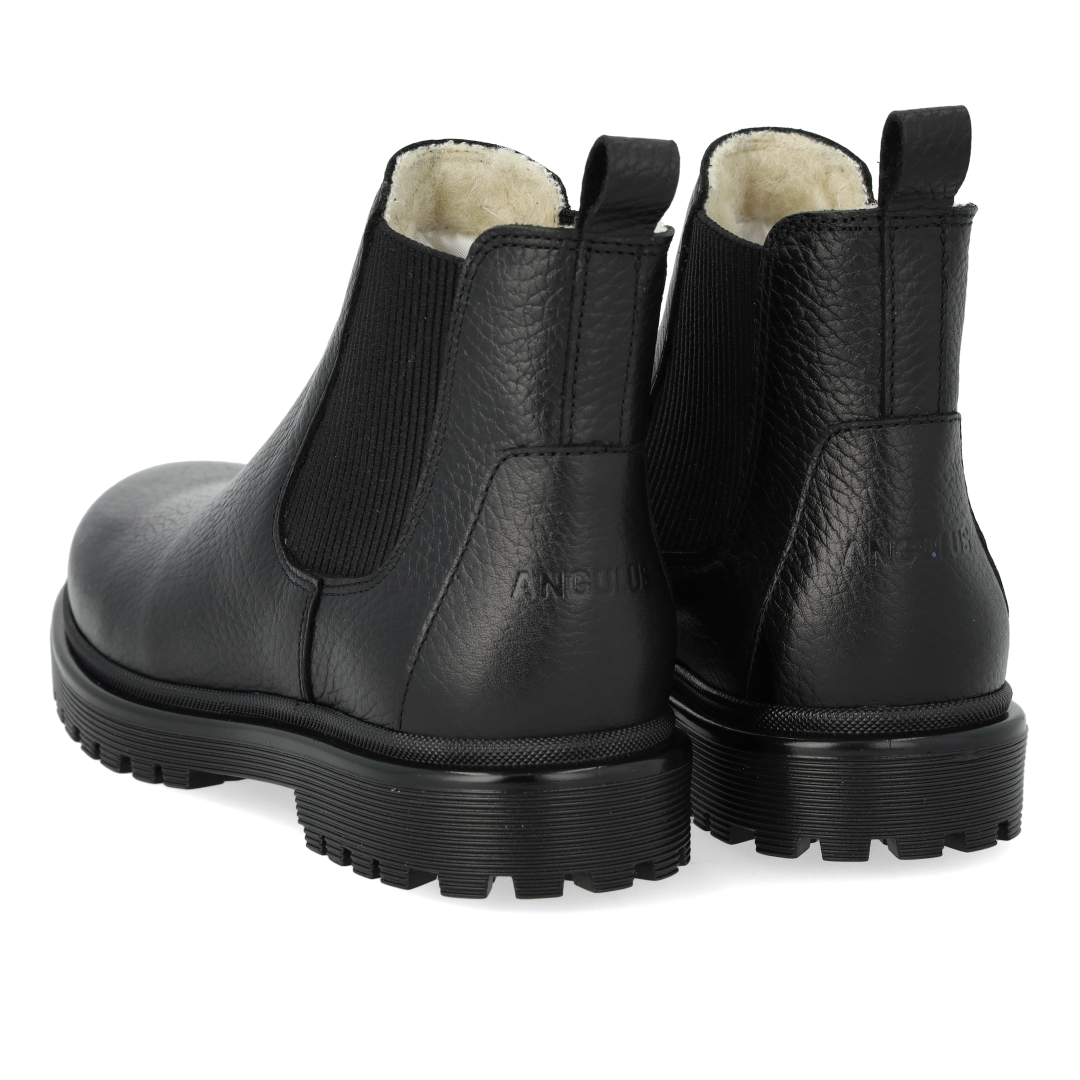 Boot with track sole and wool lining