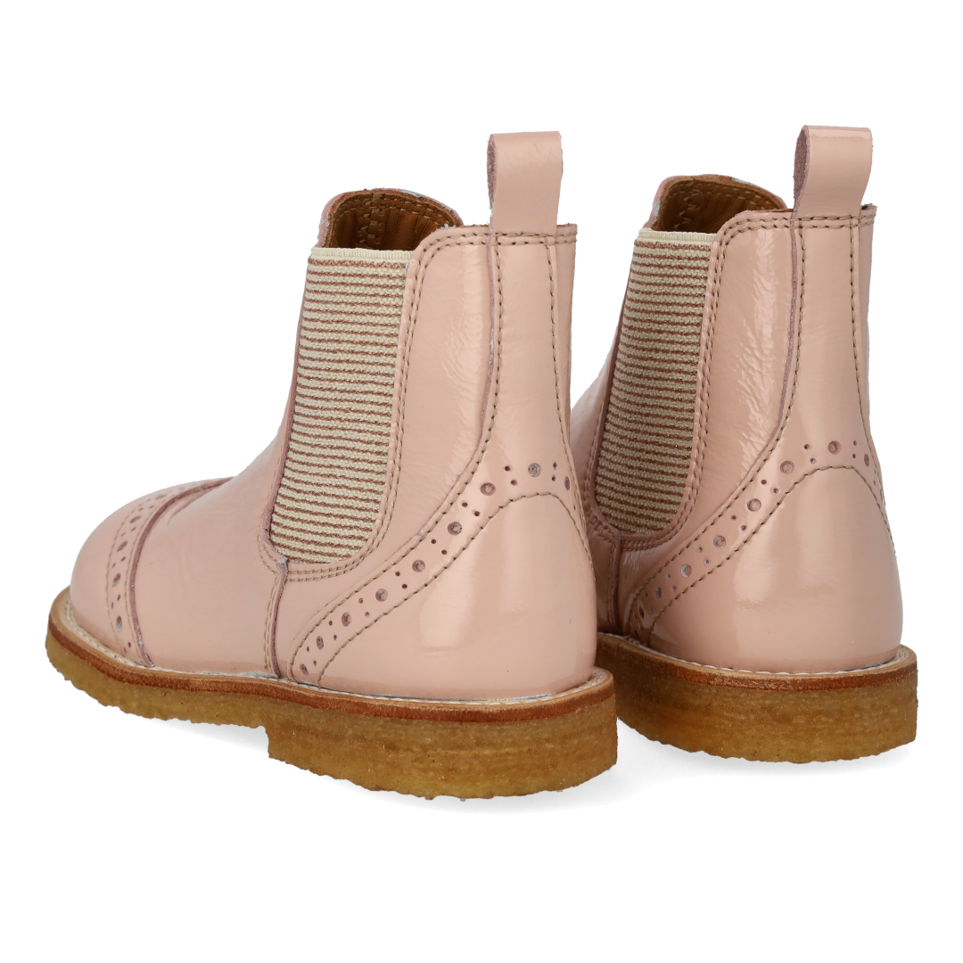 Chelsea boot with decorative brogue perforations