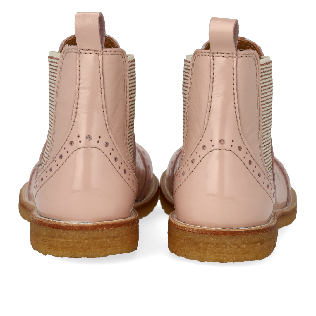 Chelsea boot with decorative brogue perforations