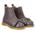 Chelsea boot with patent leather toe and bow