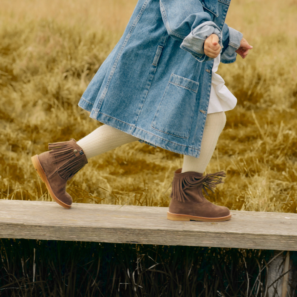 Cowboy boot with fringe and embroidery