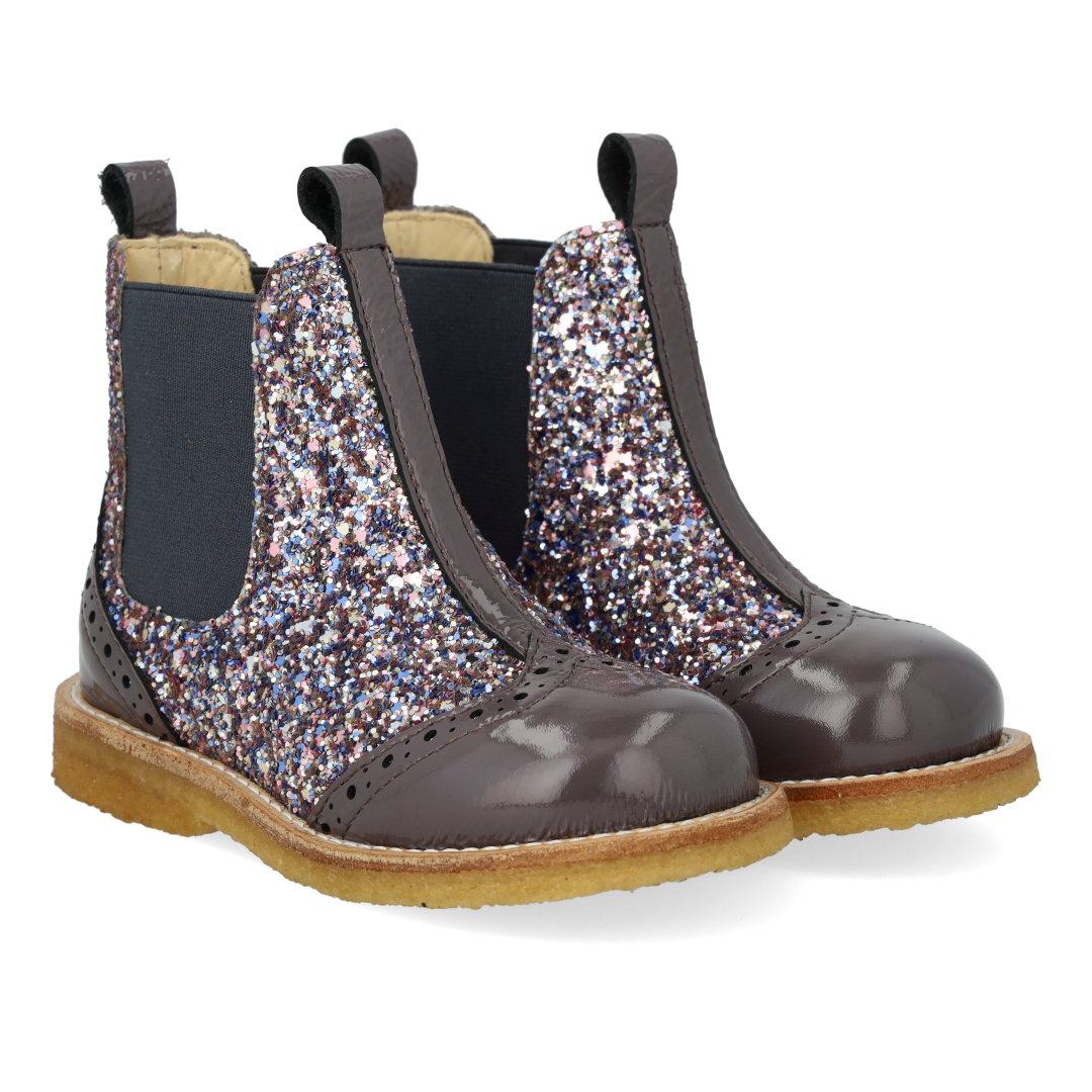 Chelsea boot with brogue perforations