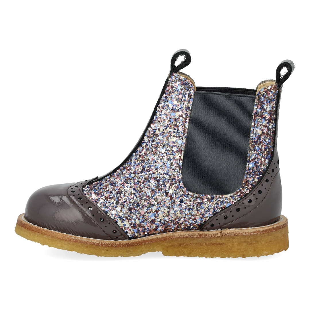 Chelsea boot with brogue perforations