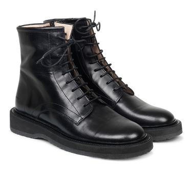 Boot with zipper and laces