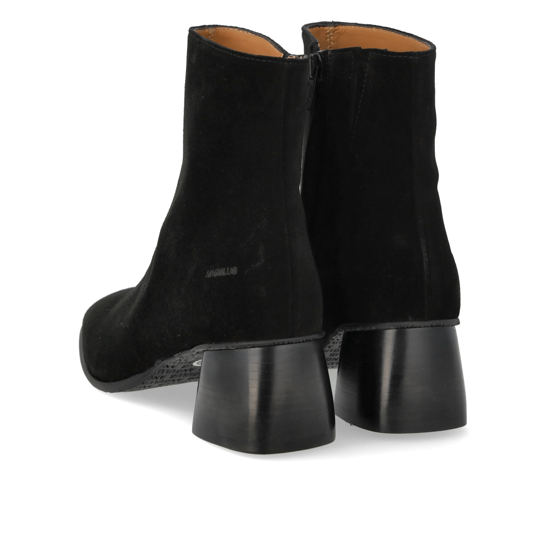 Ankle boot with sculptural black wooden heel