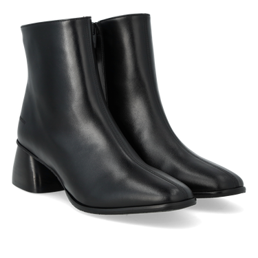 Boot with a sculptural black wooden heel