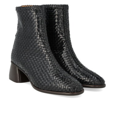 Hand-braided boot with a sculptural block heel