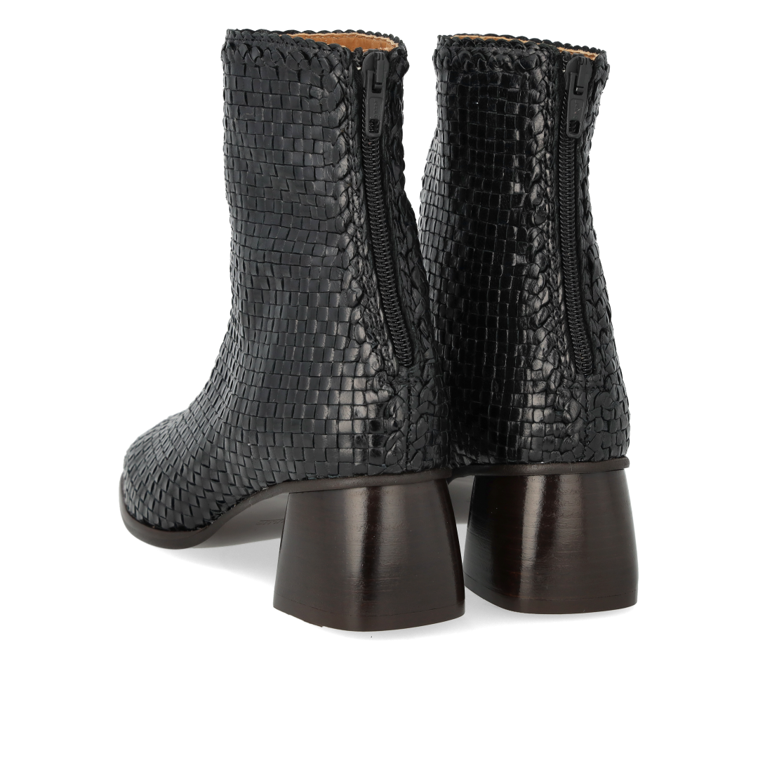 Hand-braided leather boot with sculptural block heel