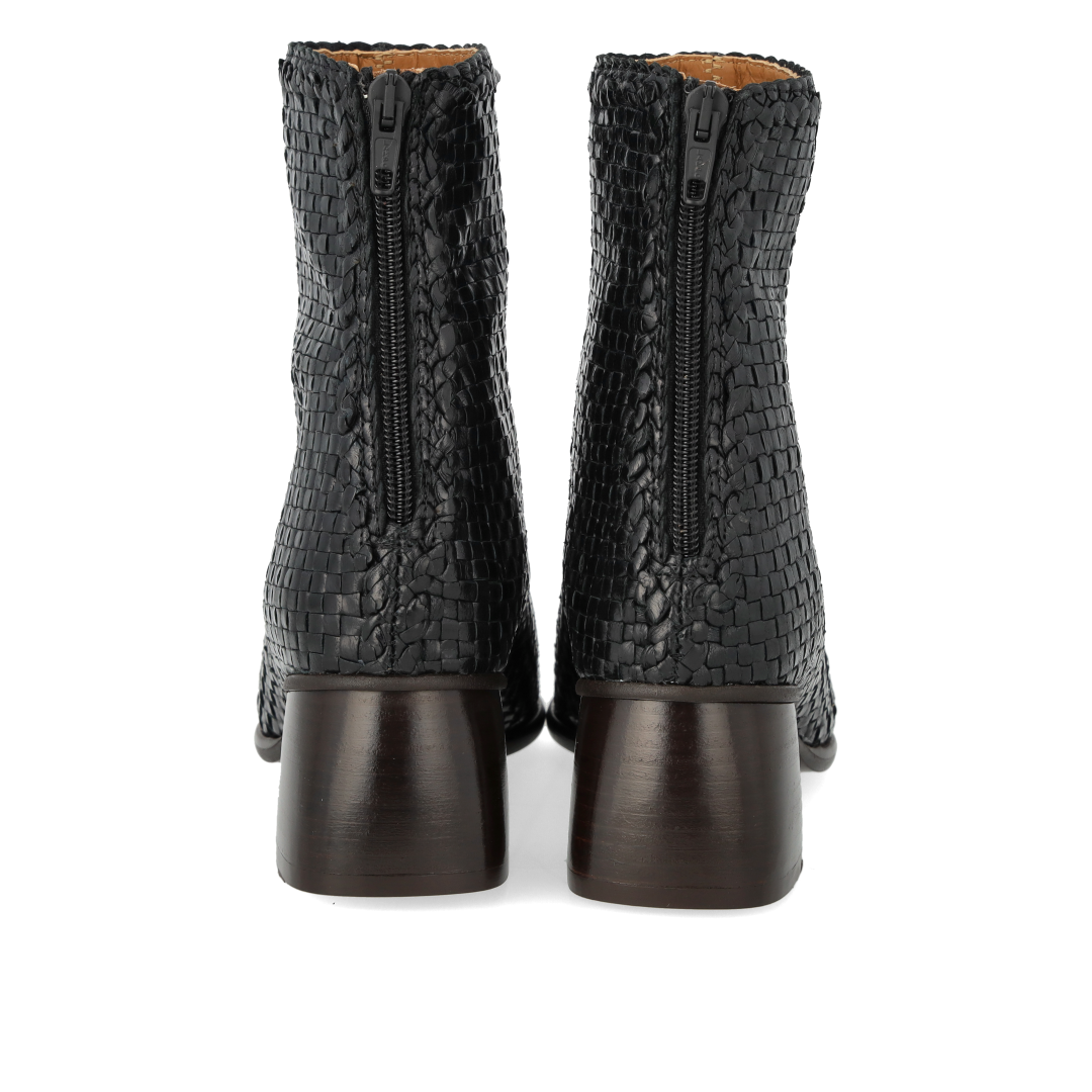 Hand-braided leather boot with sculptural block heel