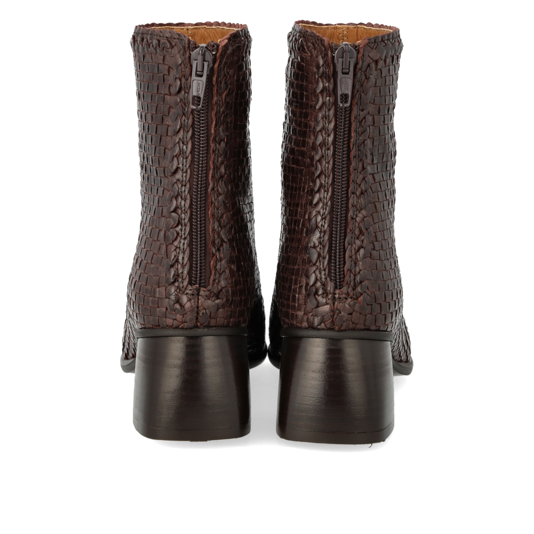 Hand-braided leather ankle boot with sculptural block heel
