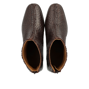 Hand-braided boot with a sculptural block heel