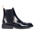Boot with decorative brogue perforation pattern