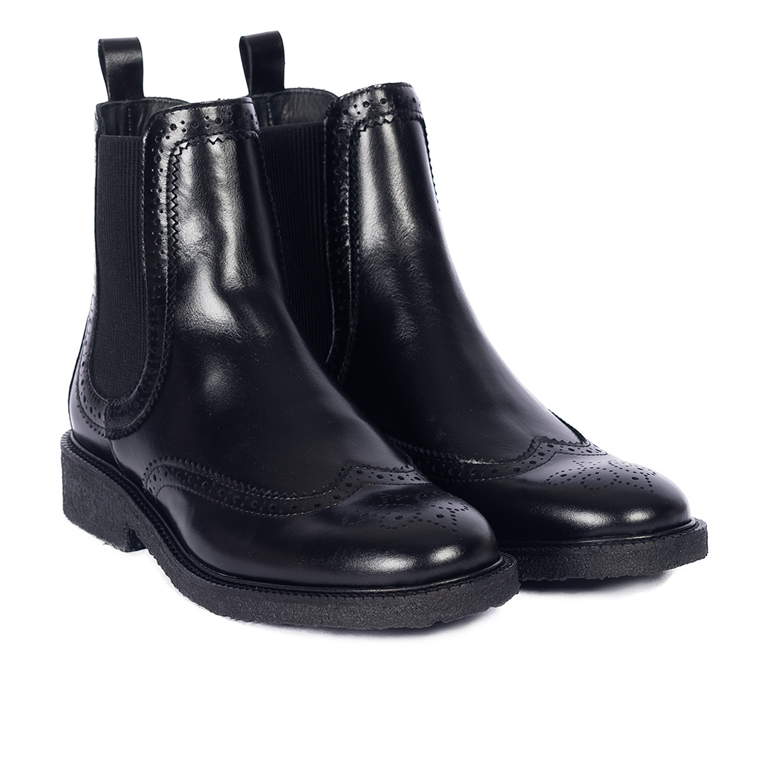 Boot with decorative brogue perforations